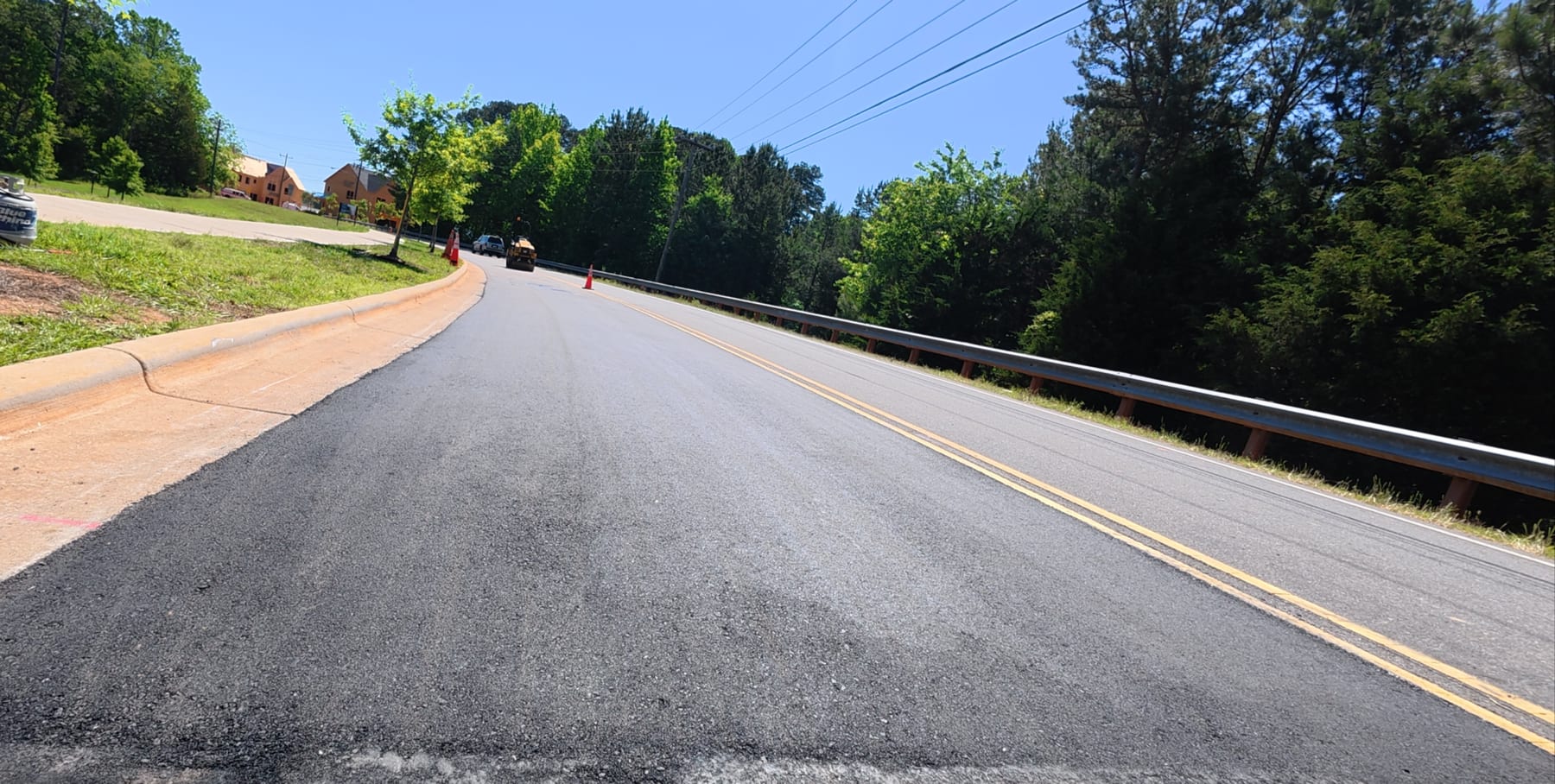 Main Roadway Repair: asphalt / pavement markings by HD Grading in Matthews, NC