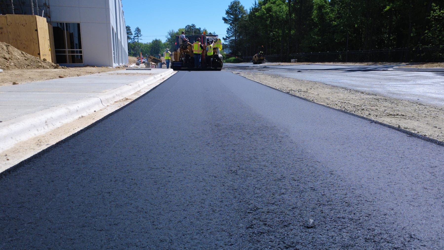 Asphalt crew at work on an HD Grading jobsite in the Carolinas